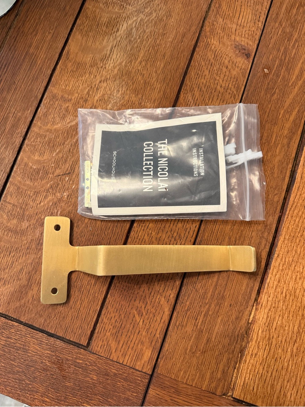 Schoolhouse Brass Toilet Paper Holder